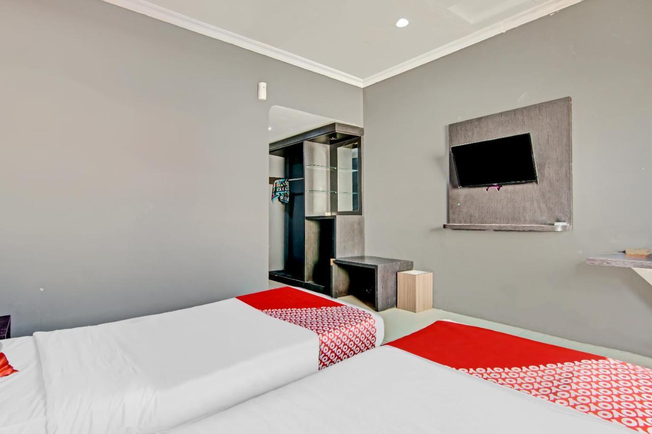 Oyo 1367 Damon Butik Hotel Pekanbaru Bagian luar foto